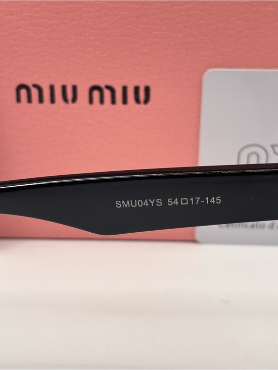 Miu Miu Black Cat Eye Sunglasses with Gradient Lenses
